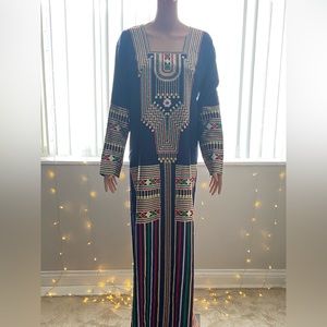 Green with detailed designs. Comes in all the sizes.